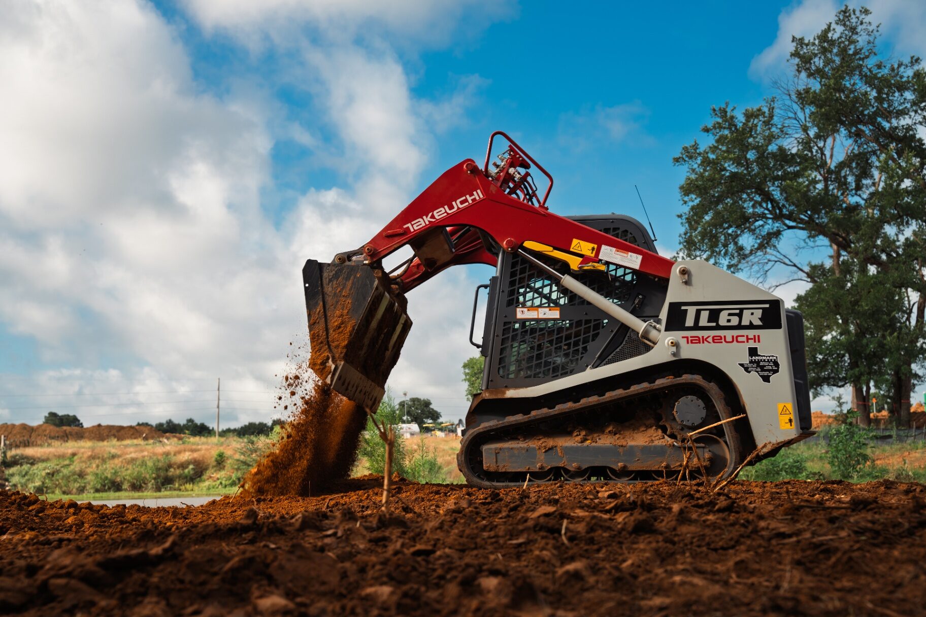 Track loader handling site prep near Kennedale, Texas